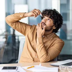 business-man-adjusting-glasses