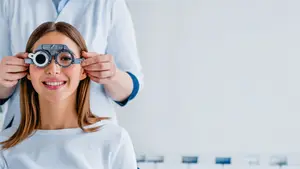 Woman getting her eyes examined at the optometrist in Marion, Cedar Bluff, Bristol, Abingdon, and Gray
