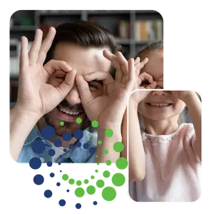 father and daughter making funny faces at the camera