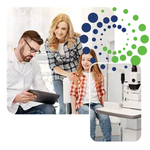 Ophthalmologist checking a young girl's eyes with an ophthalmoscope