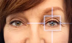 A close up of an older woman's eyes with wrinkles and a square highlighting her eyes