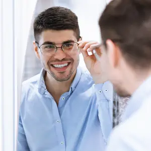 business-man-adjusting-glasses