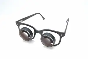black glasses with large round lenses