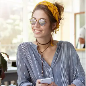stylish young woman modeling sunglasses