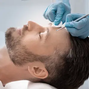Man getting a facial treatment at a beauty salon