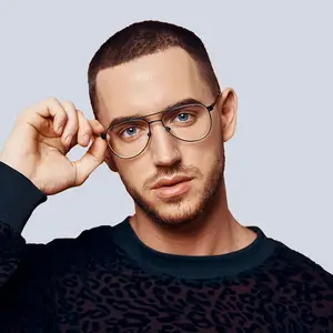 Man adjusting glasses