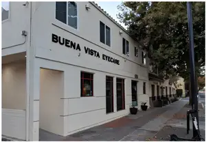A white building with the words Buena Vista Eyecare on it.