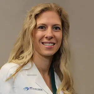 Dr. Emily E. Smith smiling for a professional headshot