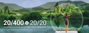 Woman standing on a dock with her arms outstretched near a lake with mountains in the background, illustrating the impact of scleral lenses in improving vision from 20/400 to 20/20.