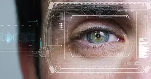 A man's eye with a chip implanted in the iris, a futuristic concept.