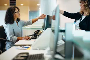 A patient at Skippack Vision Family Eyecare in Skippack, PA having her eyes checked.