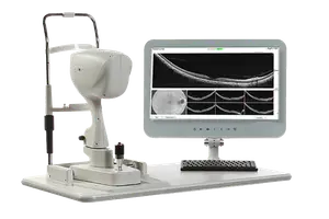OCT machine with screen showing retinal images