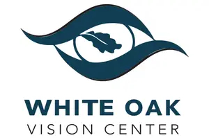 White Oak Vision Center logo featuring an eye with a leaf in the center