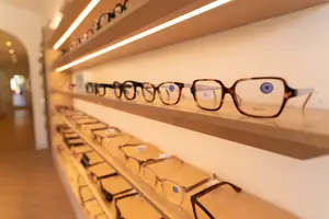 Modern optical eyeglass frames displayed at Maison De Vision Eye Care Studio