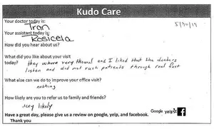 A handwritten note with comments about a medical visit and a request for a review on Google, Yelp, and Facebook