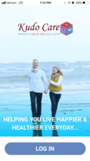 Kudos Care app advertisement with a man and woman walking on the beach holding hands