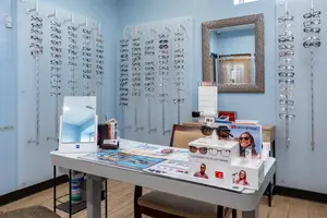 an eyeglass shop with a variety of frames on display