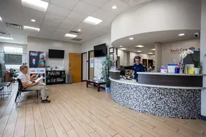 A patient waiting for his eye care appointment at Kudo Care Center in Irving, TX