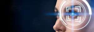A woman's face with a scanning icon on her eye, symbolizing the use of facial recognition technology.