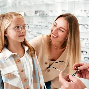 child picking new eyewear