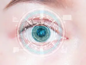 A close-up of a woman's eye with a futuristic blue iris and a circular design in front of it.