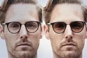 Two men with different facial hair styles and wearing glasses