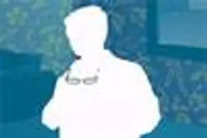 A blurred image of a person standing with their arms crossed, wearing a white shirt with the word 'foot' on it.