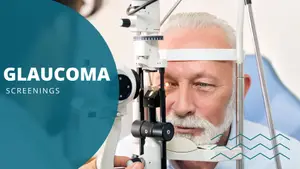 A man with white hair and a beard is undergoing a glaucoma screening at an eye clinic.