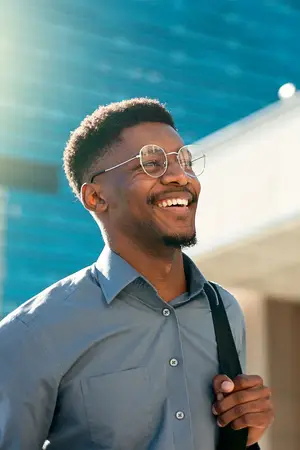 man with glasses smiling
