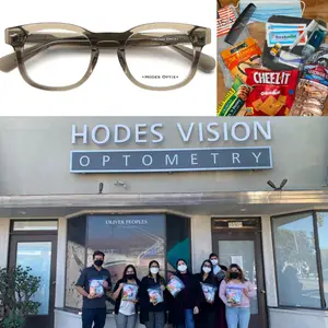 Hodes Vision Optometry team standing outside with care packages in their hands, one of them wearing glasses, the other wearing a mask.