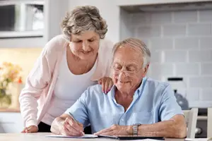 senior couple reviewing their medical insurance plan