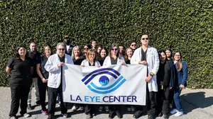 LA Eye Center staff posing for a group photo outside the clinic