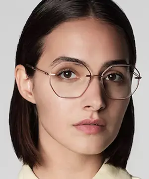 Woman wearing glasses with a neutral expression
