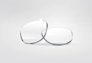 Two clear plastic lenses on a white background.