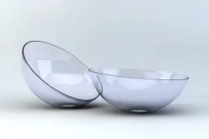 Two transparent glass bowls, one slightly overlapping the other, set on a white background.