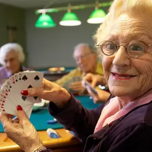 An elderly woman is smiling while holding a deck of cards and playing poker with other elderly people at a table